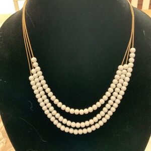 White bead necklace